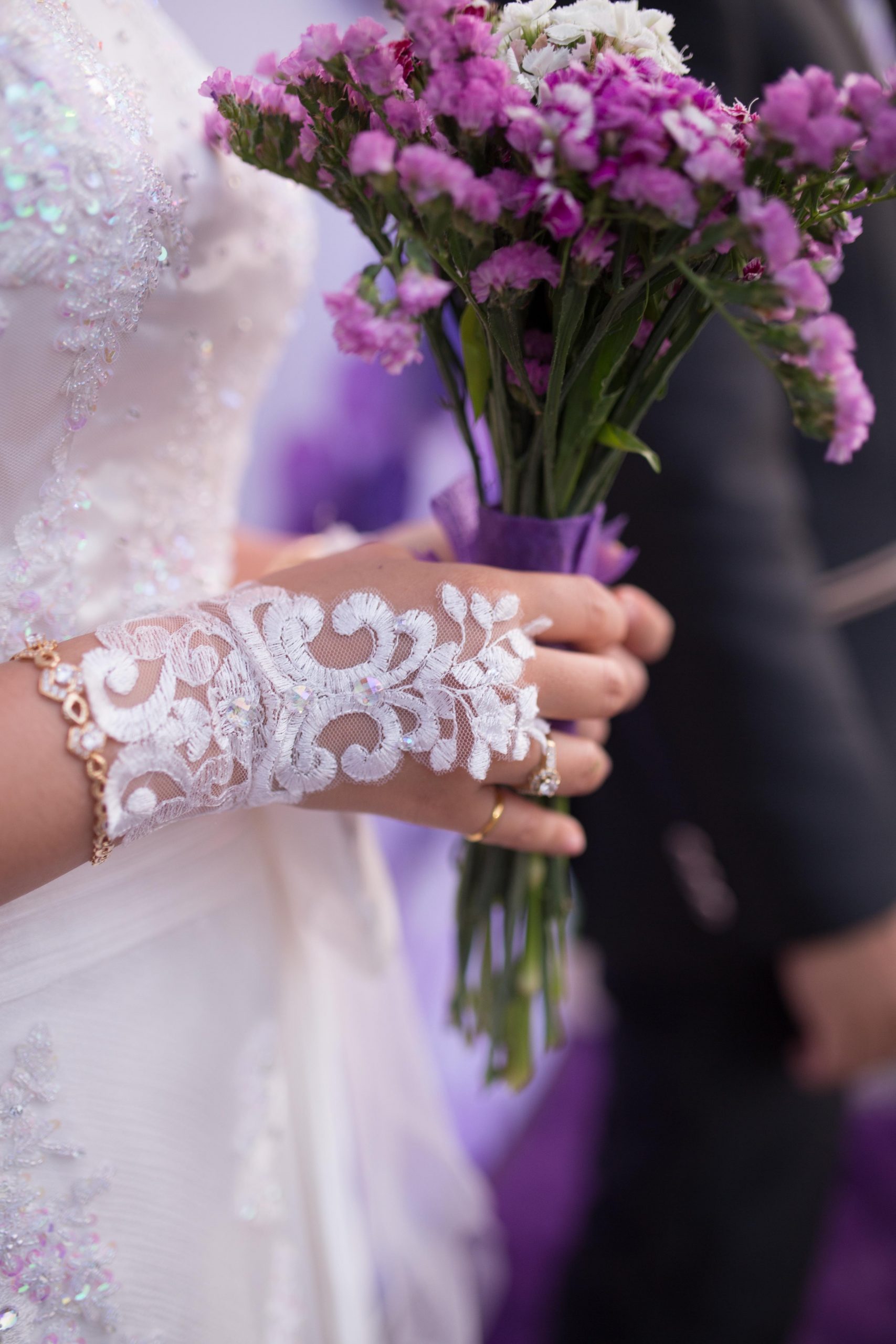 Imagine purple-bouquet-on-a-bride-s-hand-2892274-scaled.jpg