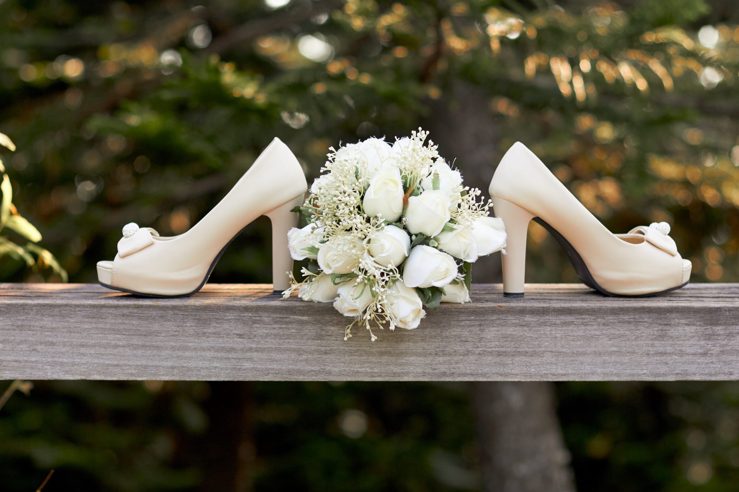 Imagine selective-focus-photography-of-pair-of-white-open-toe-chunky-1445697-scaled.jpg